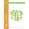 The front cover of a KS1 maths workbook features a large green cube with numbers and symbols