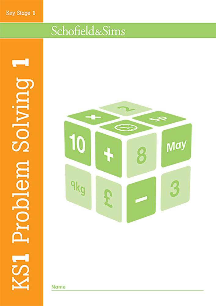 The front cover of a KS1 maths workbook features a large green cube with numbers and symbols