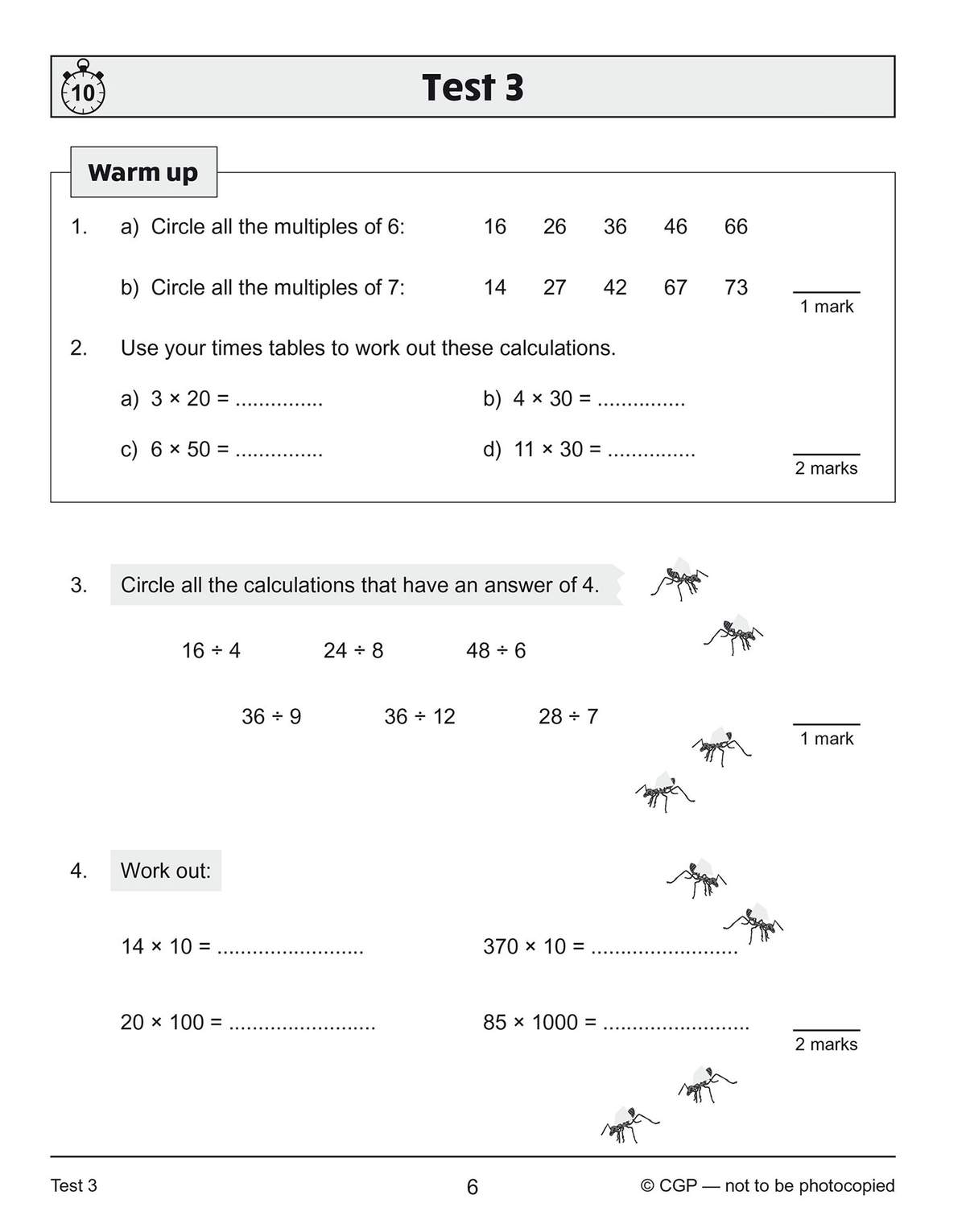 A timed test page with four questions on multiples, times tables, and division, plus a 10-minute timer
