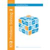 The front cover of a KS2 maths workbook for ages 7 to 11, featuring a colourful cube with numbers and symbols